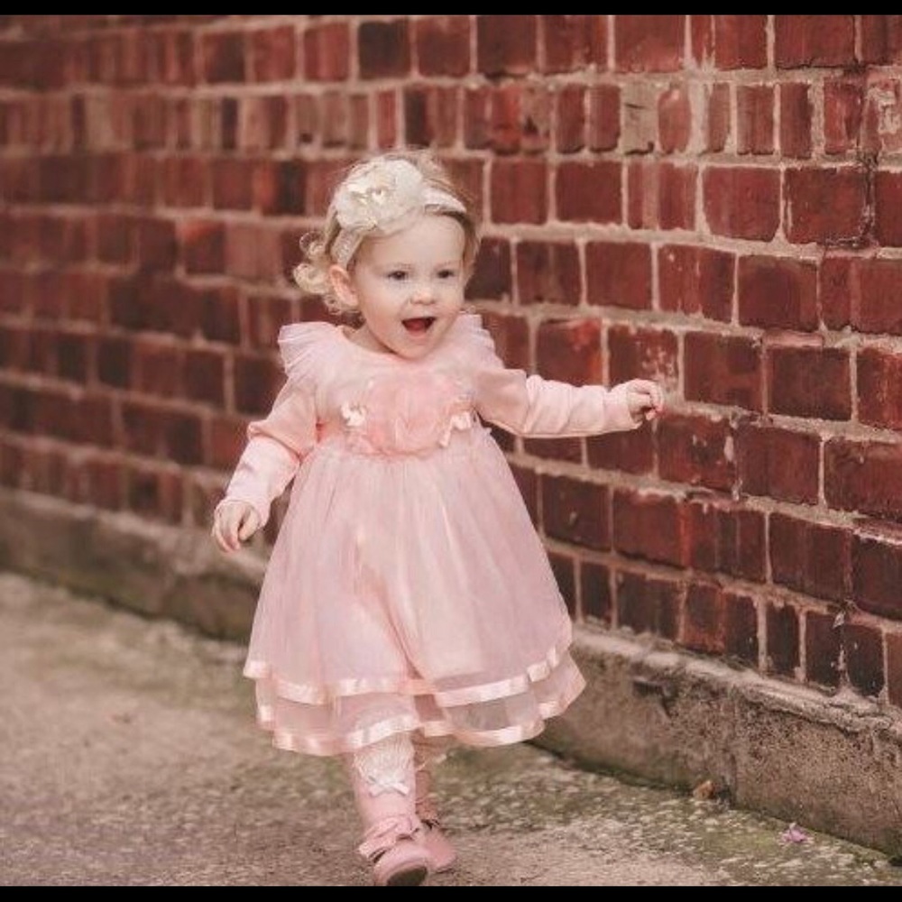 Peach dress with flower waistband